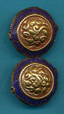 Carved brass round with lapis.JPG