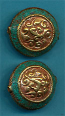 Carved brass round with turquoise.JPG