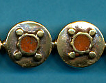 Circle with circle x 4 coral