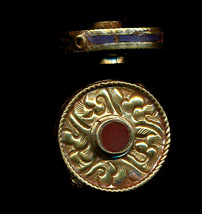 Flat Carved Disc with coral and lapisl.JPG